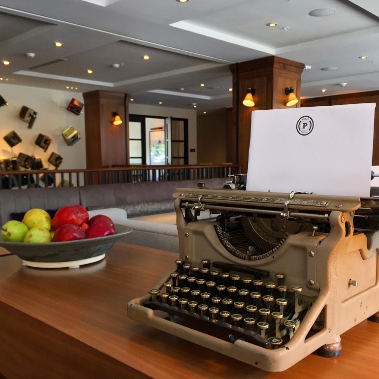 All the news, fit to print. Press Hotel lobby.